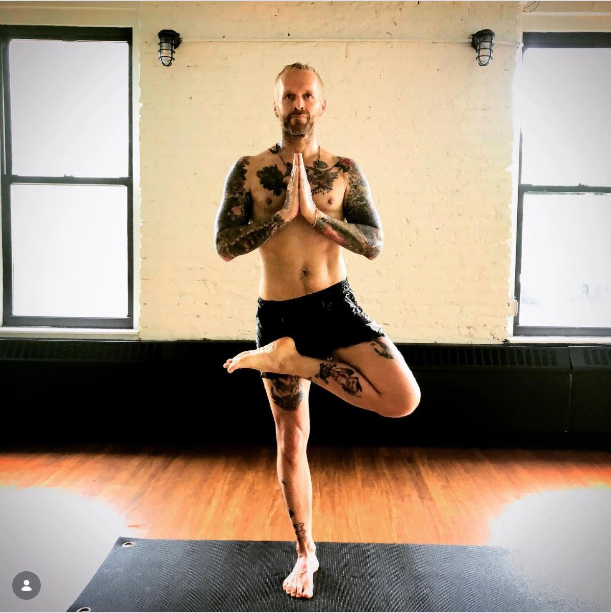 Bob Harper in a yoga tree pose